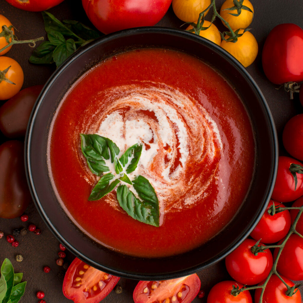 top view winter tomato soup bowl with tomatoes