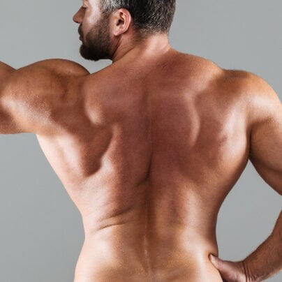 Back View Portrait Muscular Shirtless Male Bodybuilder