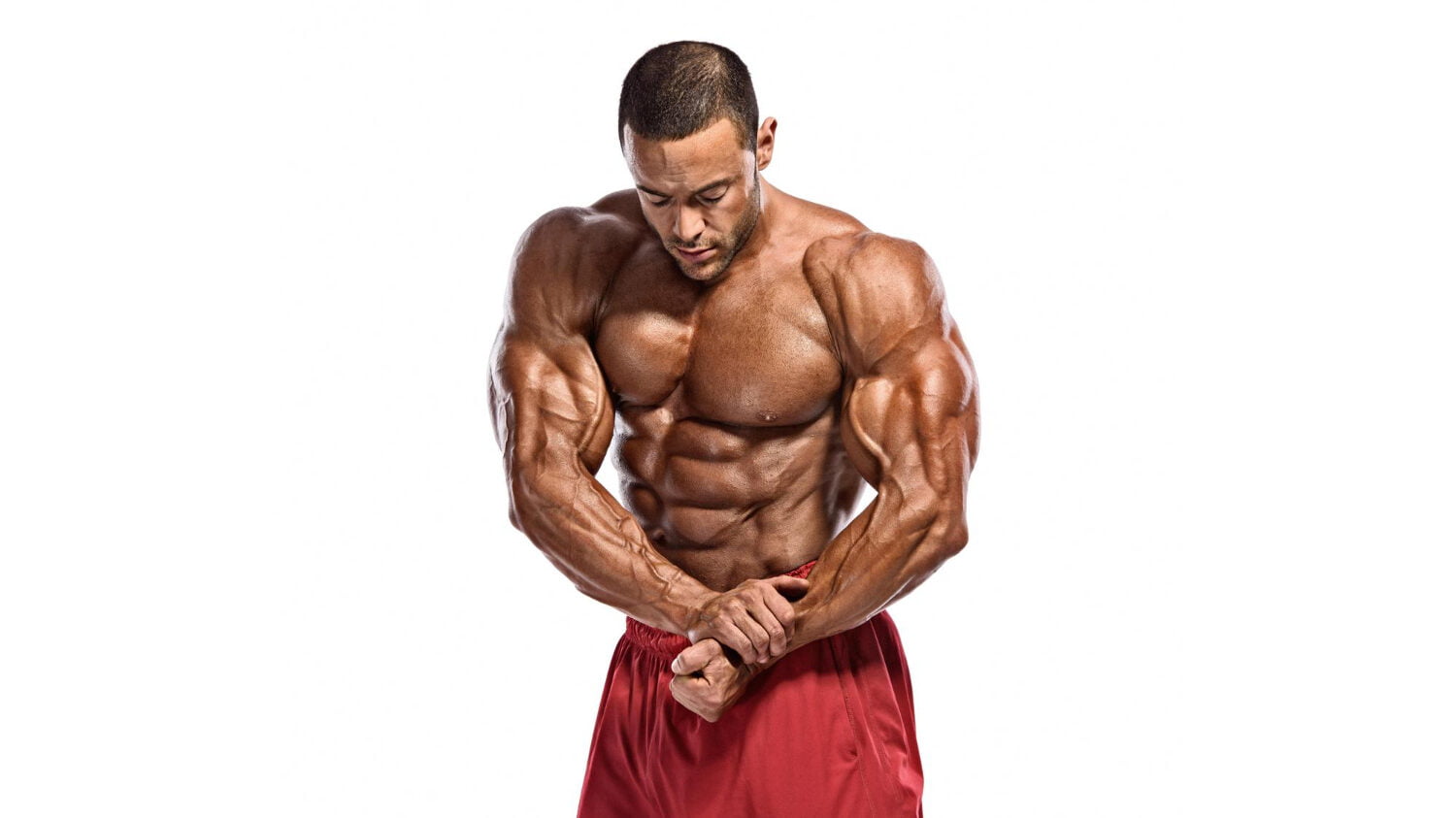 Body Builder Flexing Muscles