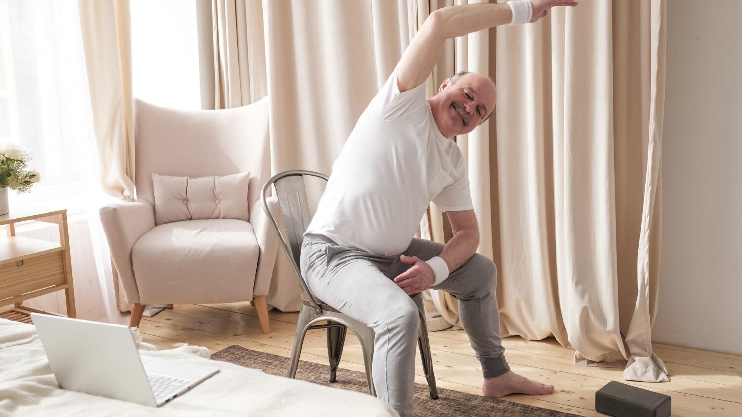 Senior Caucasian Man Stretching Side Sitting Chair His Living Room